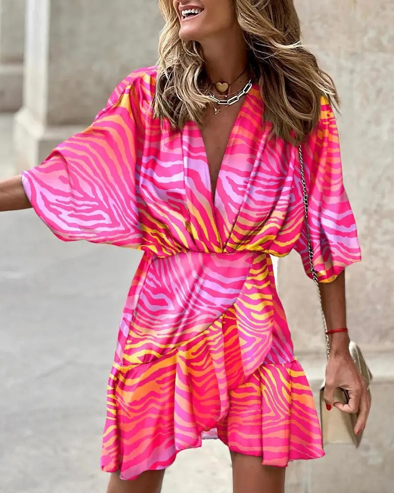 Niana - Elegantes Kleid mit V-Ausschnitt und lebhaftem Muster
