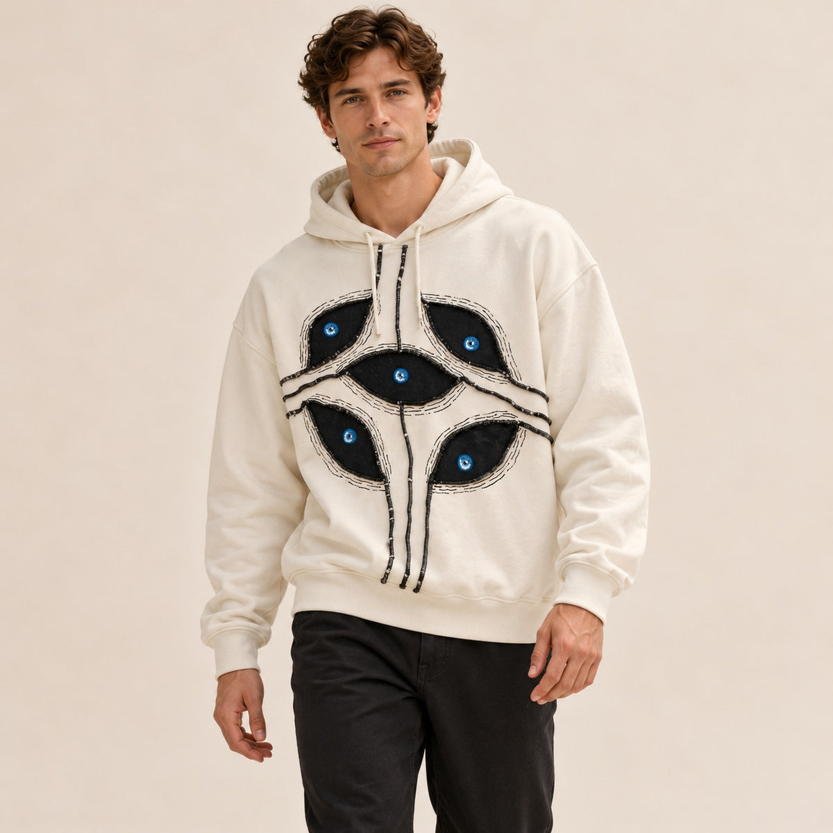 Herren Pullover-Hoodie mit Patchwork-Applikation in Augenmotiven, cropped oversize Passform